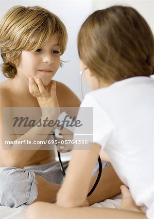 Children playing doctor with stethoscope