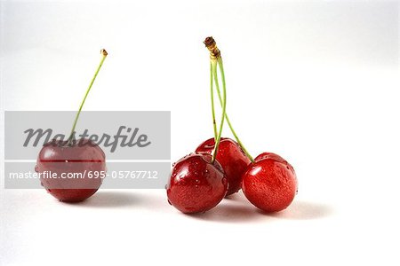 Cherries with water droplets, close-up