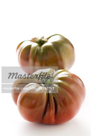 Two heirloom tomatoes, close-up