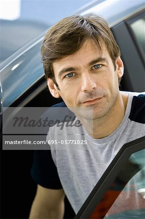 Mid-adult man preparing to get into car