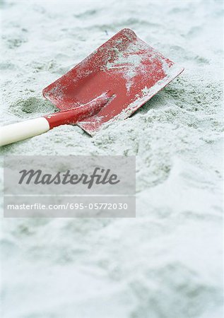 Shovel on sand