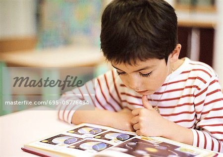 Child reading, close-up