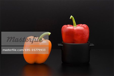 Fresh bell peppers, one in miniature pot