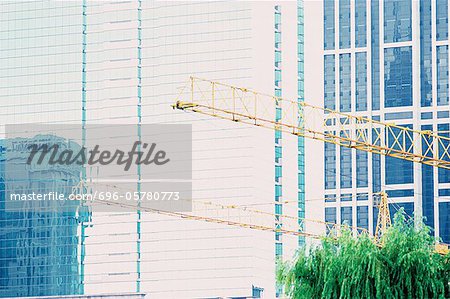 High rise relfected in glass facade