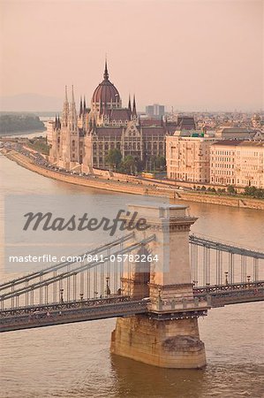 Panorama of city at sunset with neo-gothic Hungarian Parliament building, and the River Danube, UNESCO World Heritage Site, Budapest, Hungary, Europe