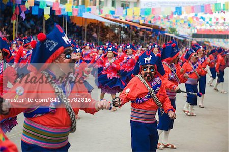 Women dancing in parade at Oruro Carnival, Oruro, Bolivia, South America