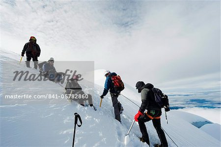 Climbers on the glacier of Volcan Cotopaxi, 5897m, the highest active volcano in the world, Ecuador, South America