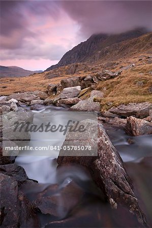 Rocky river in Cwm Idwal looking towards Tryfan at sunset, Snowdonia National Park, Conwy, Wales, United Kingdom, Europe