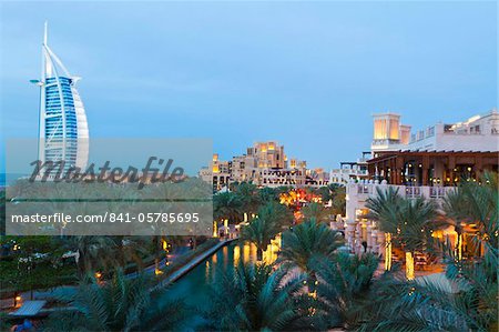 Burj Al Arab and Madinat Jumeirah Hotels at dusk, Dubai, United Arab Emirates, Middle East