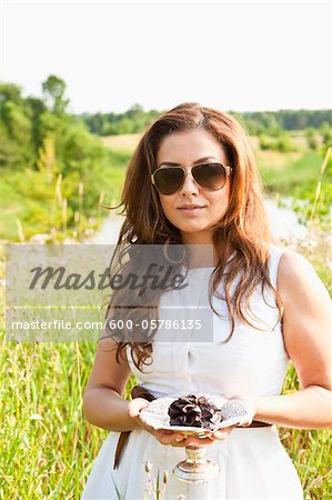 Portrait of Woman holding Dessert Bowl, Ontario, Canada