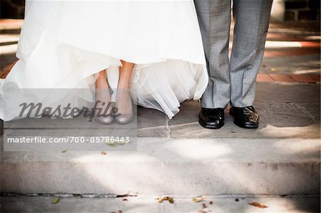 Close-Up of Bride and Groom's Feet