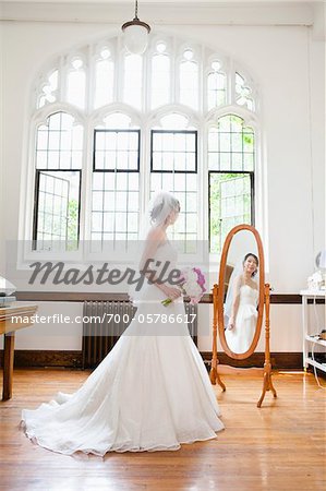 Bride Looking in Mirror