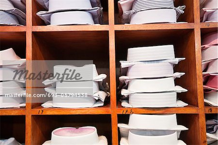 Folded shirts on clothes rack