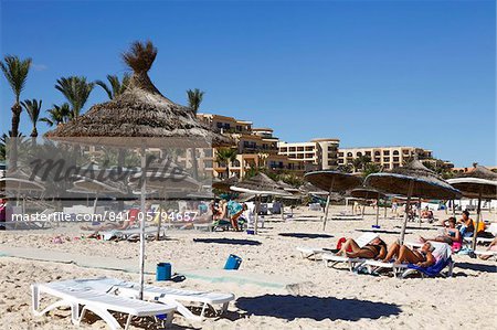 Beach scene in the tourist zone of Sousse, Gulf of Hammamet, Tunisia, North Africa, Africa