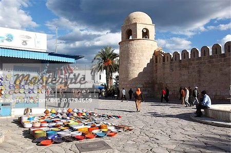 Pottery shop display outside the Great Mosque, Place de la Grande Mosque, Medina, Sousse, Tunisia, North Africa, Africa