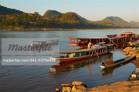 Tourist boats at sunset on the Mekong River, Luang Prabang, Laos, Indochina, Southeast Asia, Asia