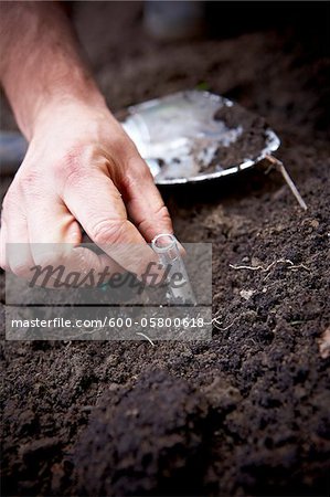 Close-up of Gardener Testing Soil, Toronto, Ontario, Canada