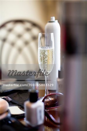 Glass of Champagne amongst Beauty Supplies