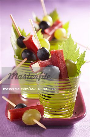 Comté wrapped in grisons meat and black grapes Comté wrapped in grisons meat and black grapes
