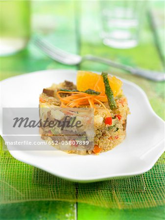 Quinoa, mandarin, seitan, carrot and red pepper in aspic Quinoa, mandarin, seitan, carrot and red pepper in aspic