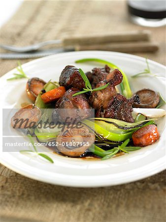 Stag and mushroom stew cooked with red wine and leeks Stag and mushroom stew cooked with red wine and leeks
