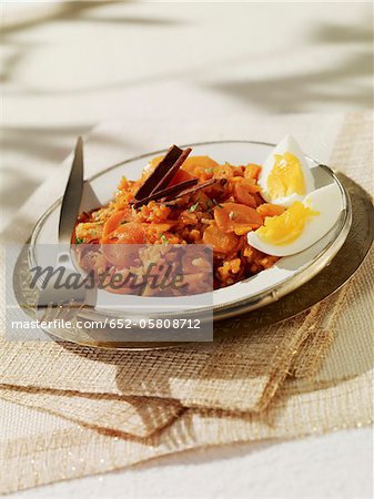 Cooked carrot salad with cinnamon and hard-boiled eggs