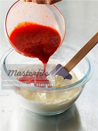 Adding the puree to the whipped cream