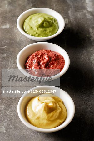 Plain mustard,tarragon mustard and blackcurrant mustard