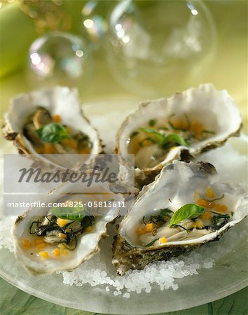 Oysters with diced carrots and basil