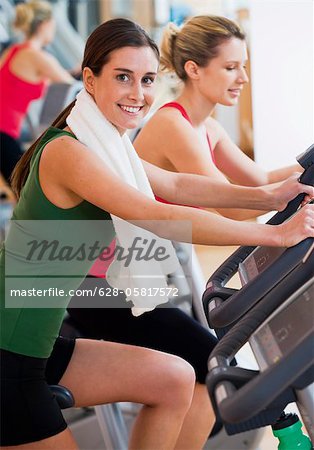 Two women exercising at a health club