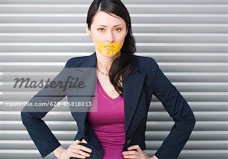 Woman with tape on her mouth