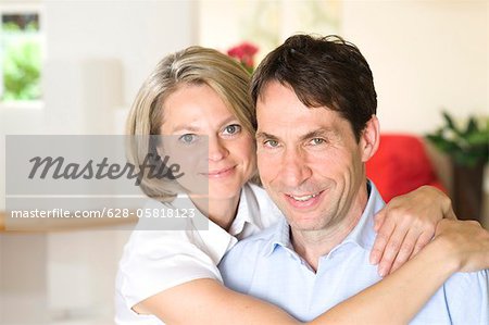 Happy couple at home, Munich, Bavaria, Germany