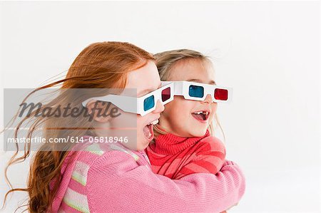 Girls wearing 3D glasses