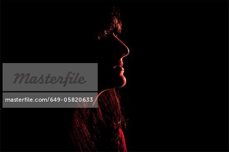 Illuminated profile of womans face