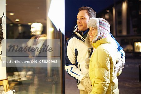 Couple window shopping together