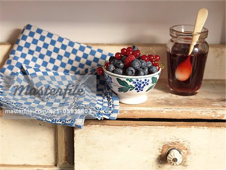 Bowl of summer fruit and summer fruit jelly