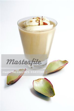 Artichoke juice with whipped cream and hazelnuts