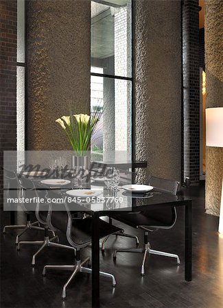 View through doorway to full length sink and mirror of Barbican Apartment, London, UK. Architects: Mackay and Partners LLP