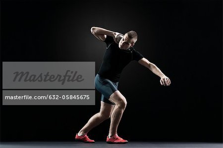 Shot putter preparing to throw shot