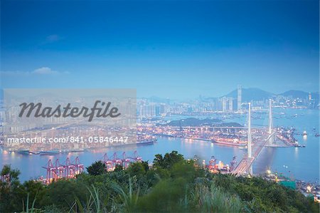 View of Stonecutters Bridge and West Kowloon from Tsing Yi at dusk, Hong Kong, China, Asia