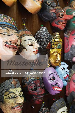 Masks at Pasar Triwindu flea market, Solo, Java, Indonesia, Southeast Asia, Asia