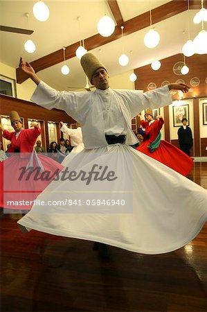 Whirling dervish performance in Silvrikapi Meylana cultural center, Istanbul, Turkey, Europe