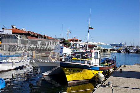 Boats and restaurants along the harbour quay, Nessebar, Black Sea, Bulgaria, Europe