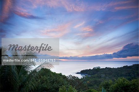 Sunrise in the jungle at Lapa Rios nature reserve on the Osa Peninsula, Costa Rica, Central America Sunrise in the jungle at Lapa Rios nature reserve on the Osa Peninsula, Costa Rica, Central America