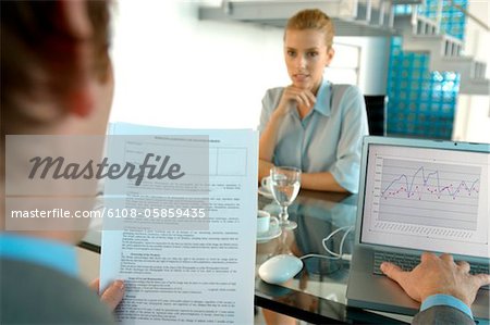 Young woman sitting in office