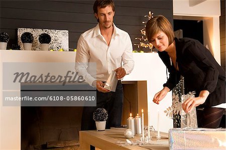 Mid adult man and a young woman celebrating Christmas