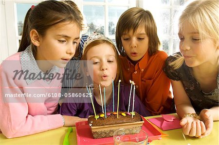 Girl celebrating her birthday with her friends