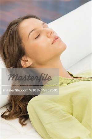 Woman lying on the bed