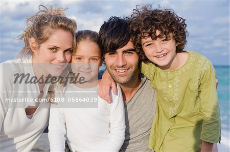 Portrait of a family smiling