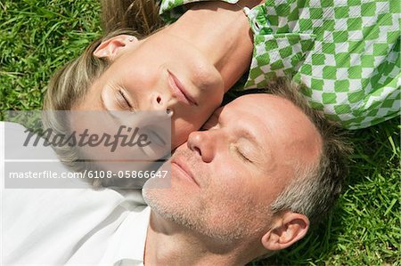 Couple lying in a park